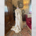 On display now through the end of the summer at Ventfort Hall is an exhibit of women’s fashion which includes 14 vintage dresses, ranging from 1850 to 1960, as well as various accessory pieces.