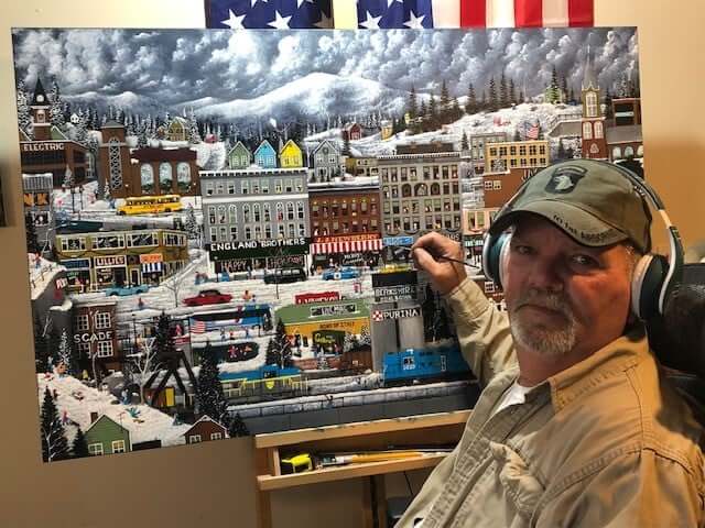 Artist Richard Haskins paints at his easel