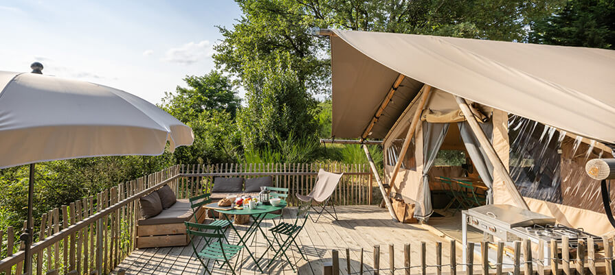 A glamping tent at the new Huttopia Berkshires overlooks the scenic Berkshire mountains