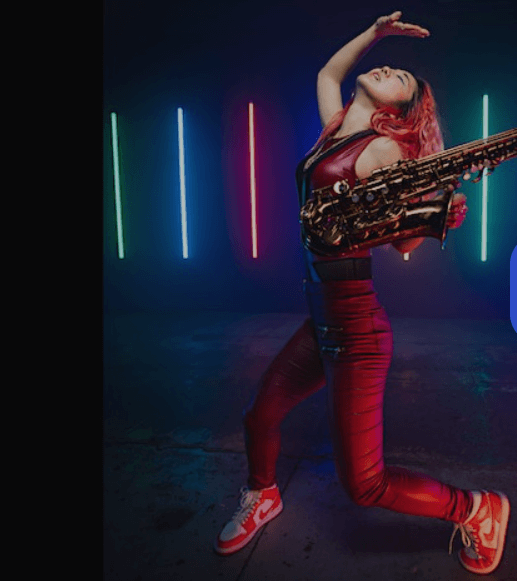 Musician Grace Kelly performs with her saxophone