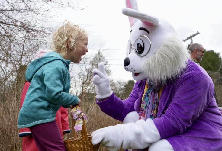 The Easter Bunny speaks to a young child