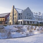 The Williams Inn building stands prominant among the wintery snow landscape.