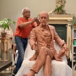Life sized sculpture of W.E.B. Du Bois being completed by the sculptor