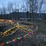 Bliss Point's peace garden with painted rocks