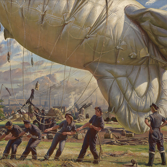 Women hoisting an air balloon in WWII