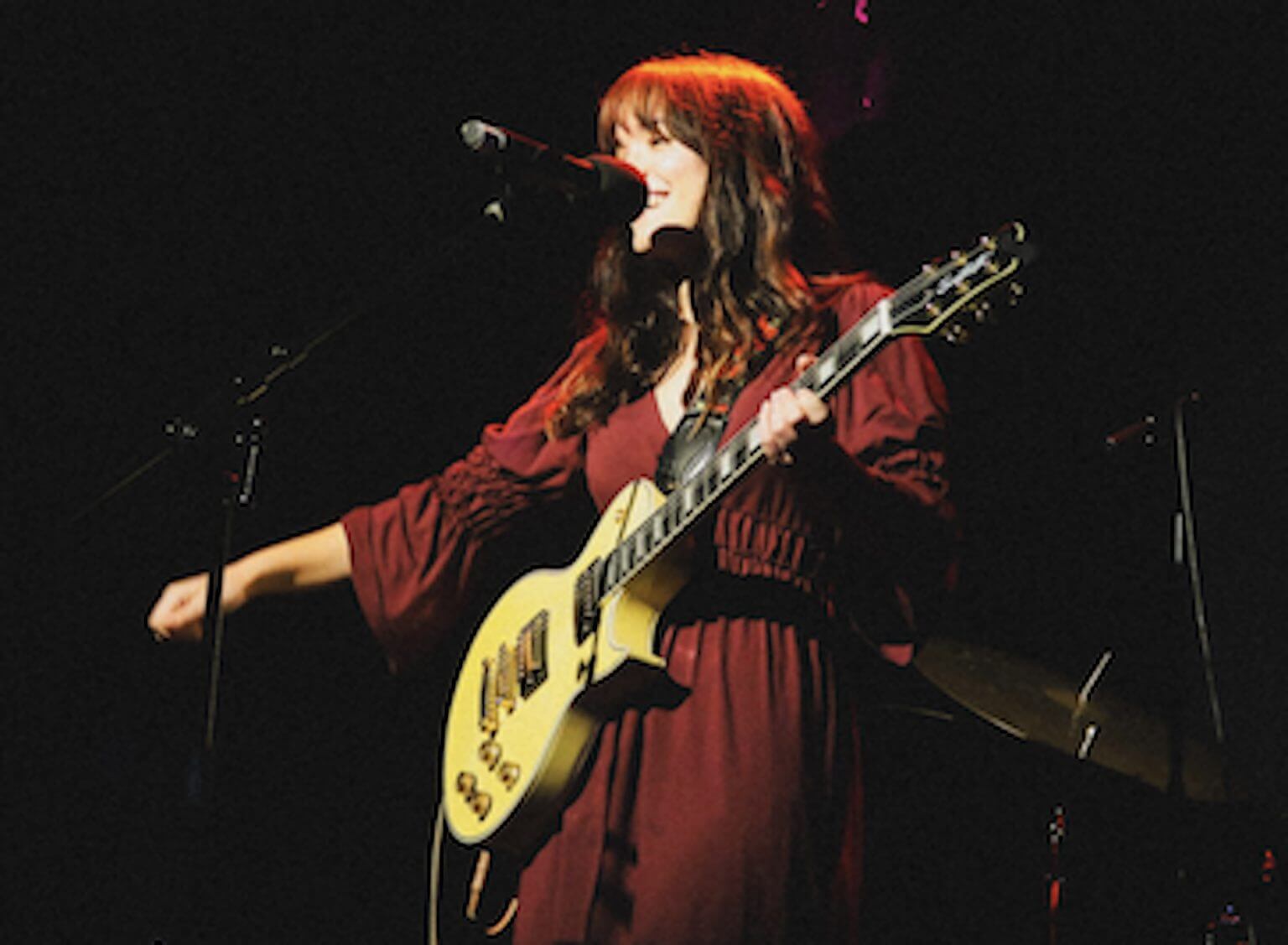 Singer Glori Wilder performs with her guitar