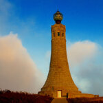 Mt. Greylock Summit photo credit kara thornton 895×450 Mt Greylock Summit monument stands tall during sunset with blue sky and clouds around it